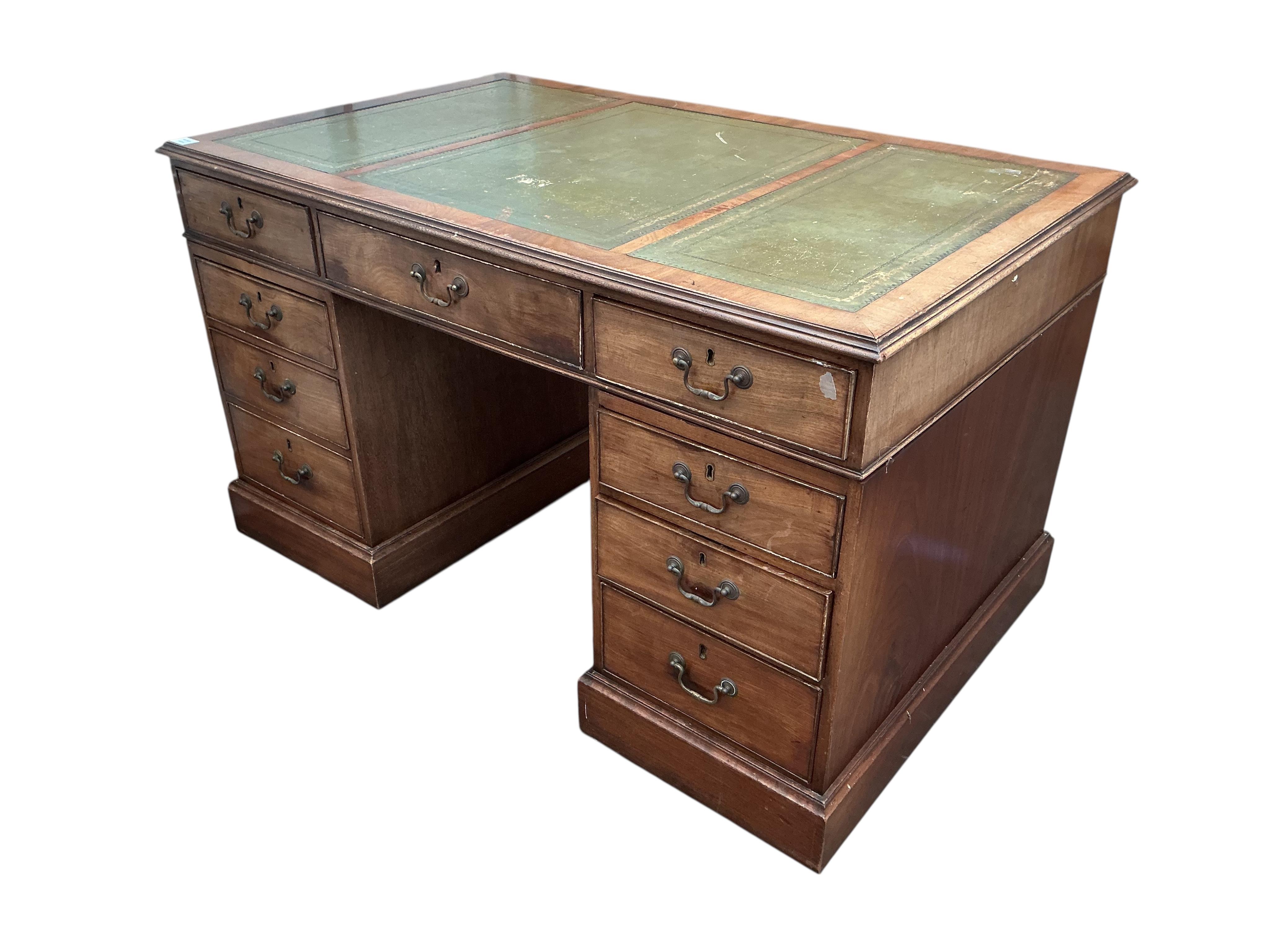 A reproduction George III style mahogany pedestal desk, width 132cm, depth 82cm, height 78cm